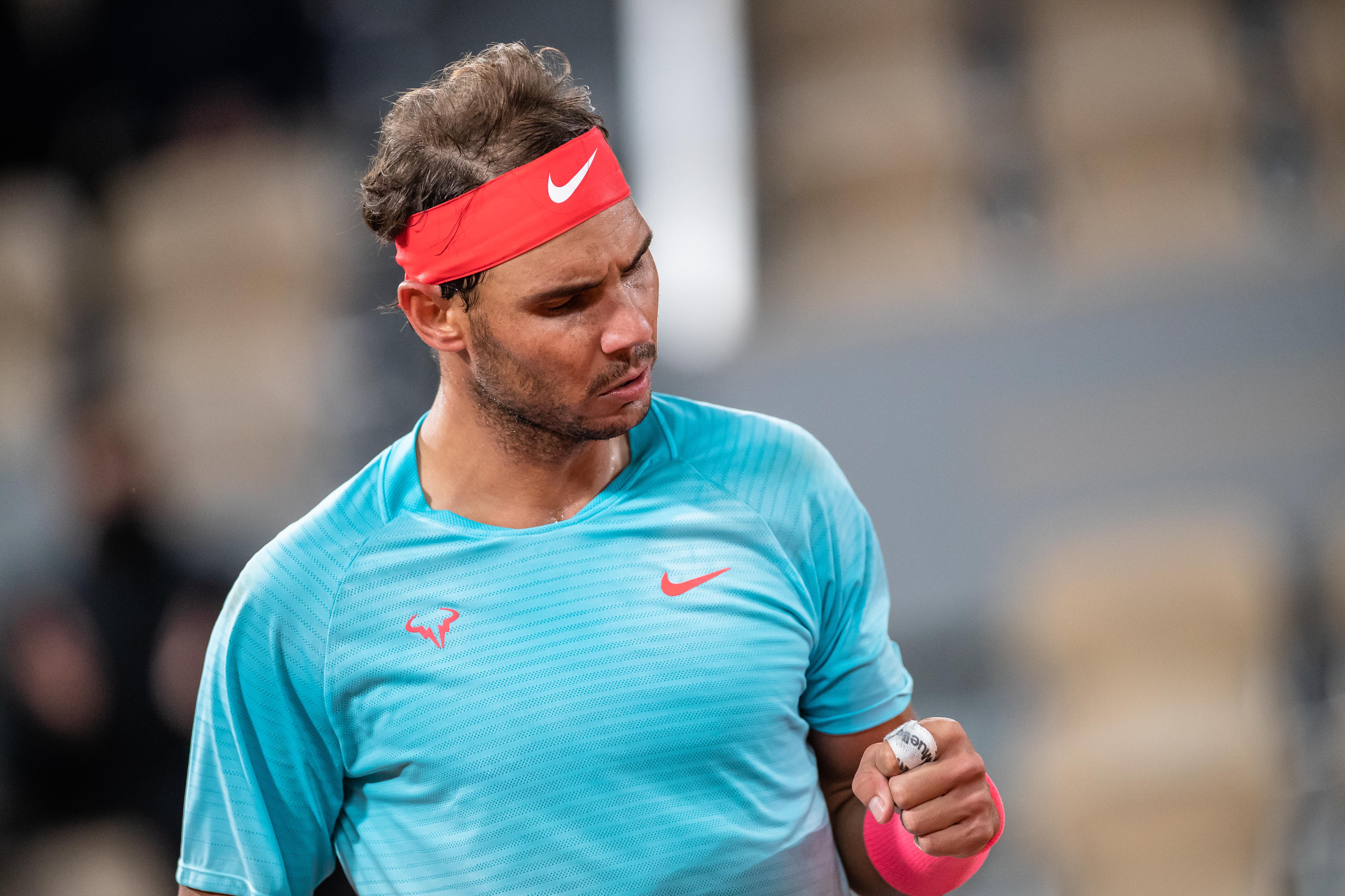 包含法网轻取美网，纳达尔刷新纪录的词条